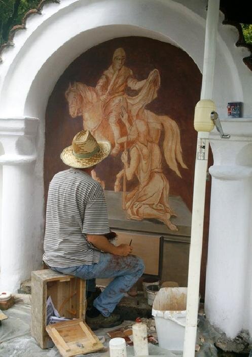 Jeden z restaurátorů.
