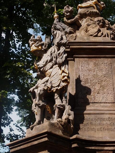 Původně sousoší stálo na dnešním Sokolovském náměstí, odkud bylo v roce 1877 přeneseno na současné místo.