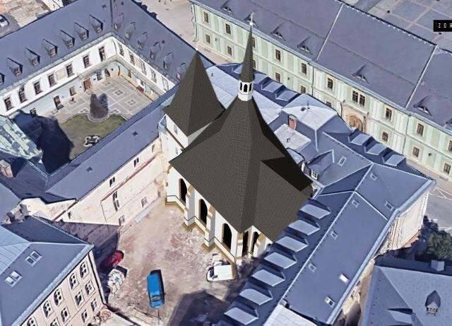 Hmotová rekonstrukce kostela zasazená do stávající zástavby města